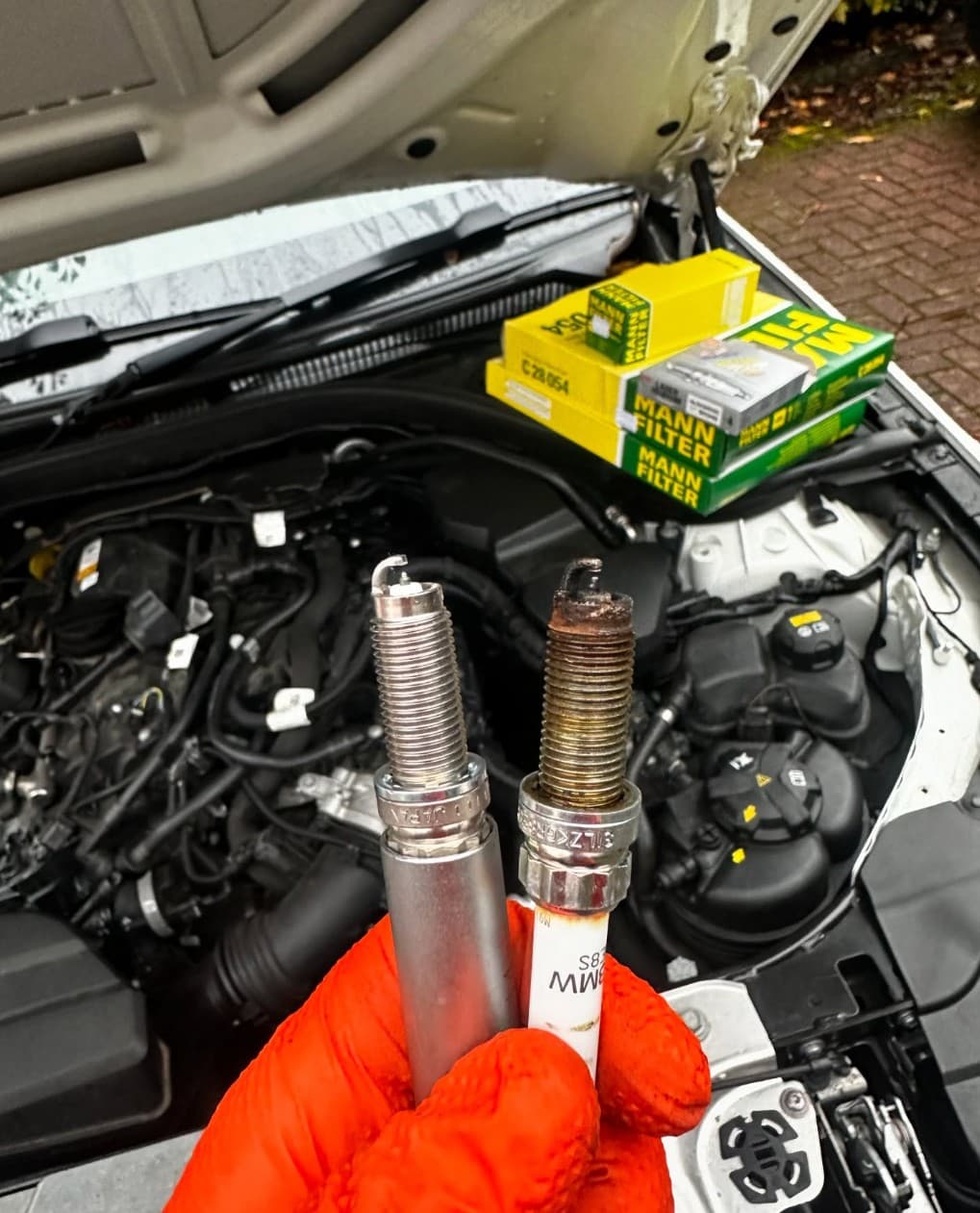 Mechanic working on a car