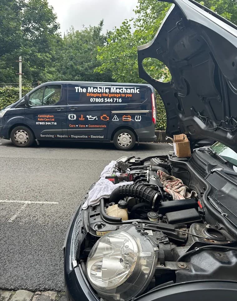 Mechanic working on a car